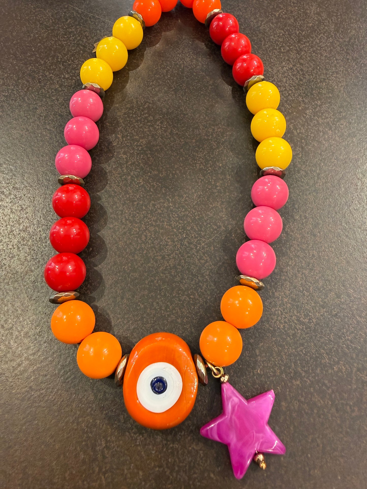 Phone holder tutti frutti star - detail shot - bracelet | Love Letters Tel Aviv