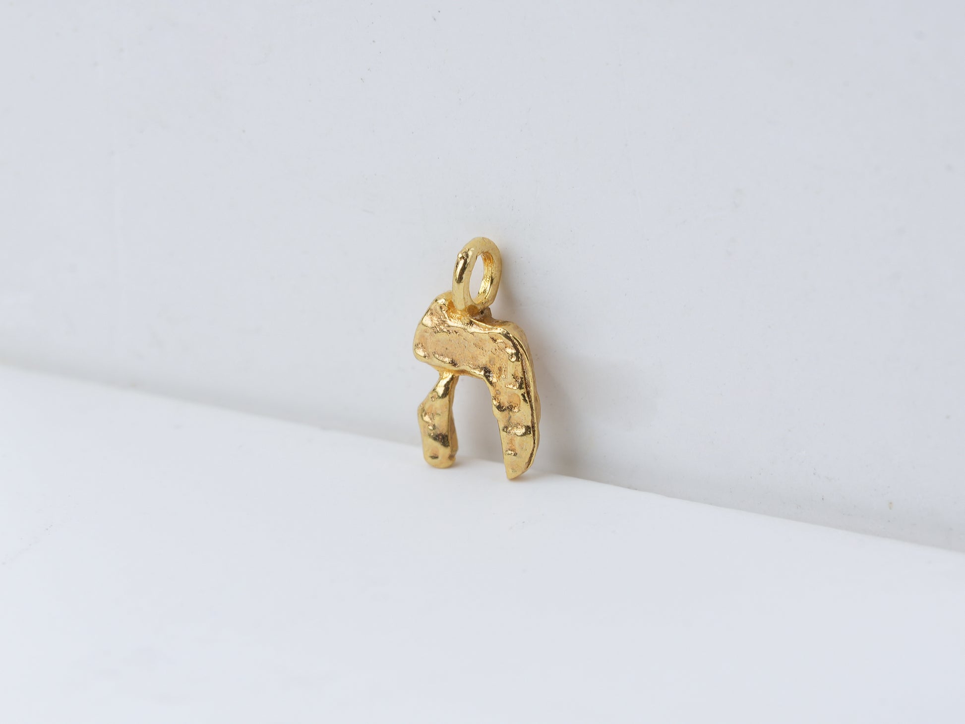 ה - he - detail shot - Hebrew letter charm | Love Letters Tel Aviv