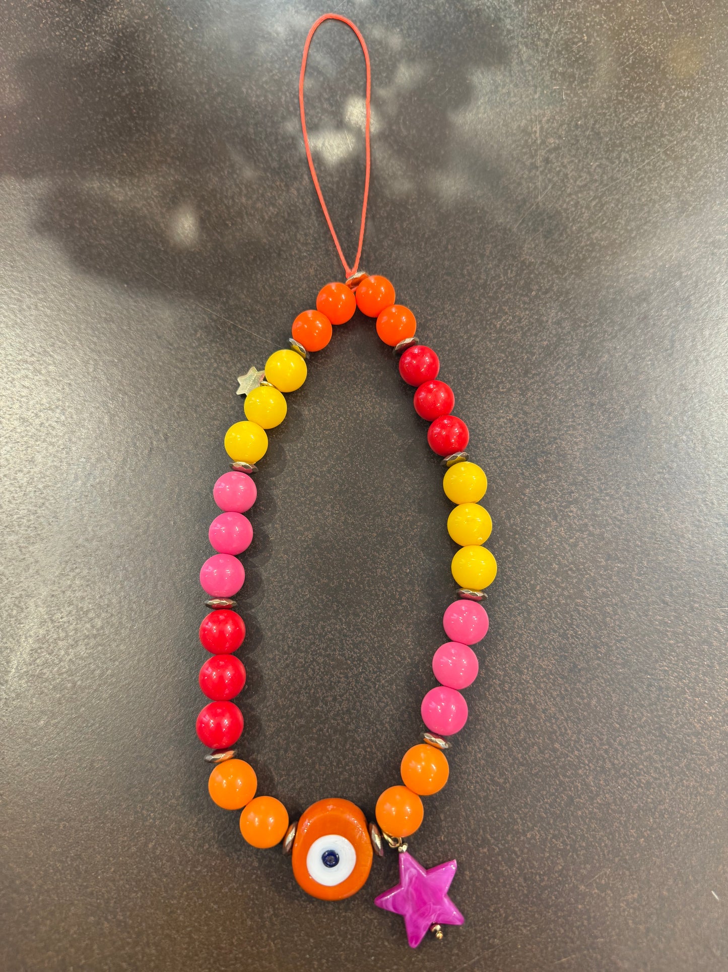 Phone holder tutti frutti  star - detail shot - bracelet | Love Letters Tel Aviv
