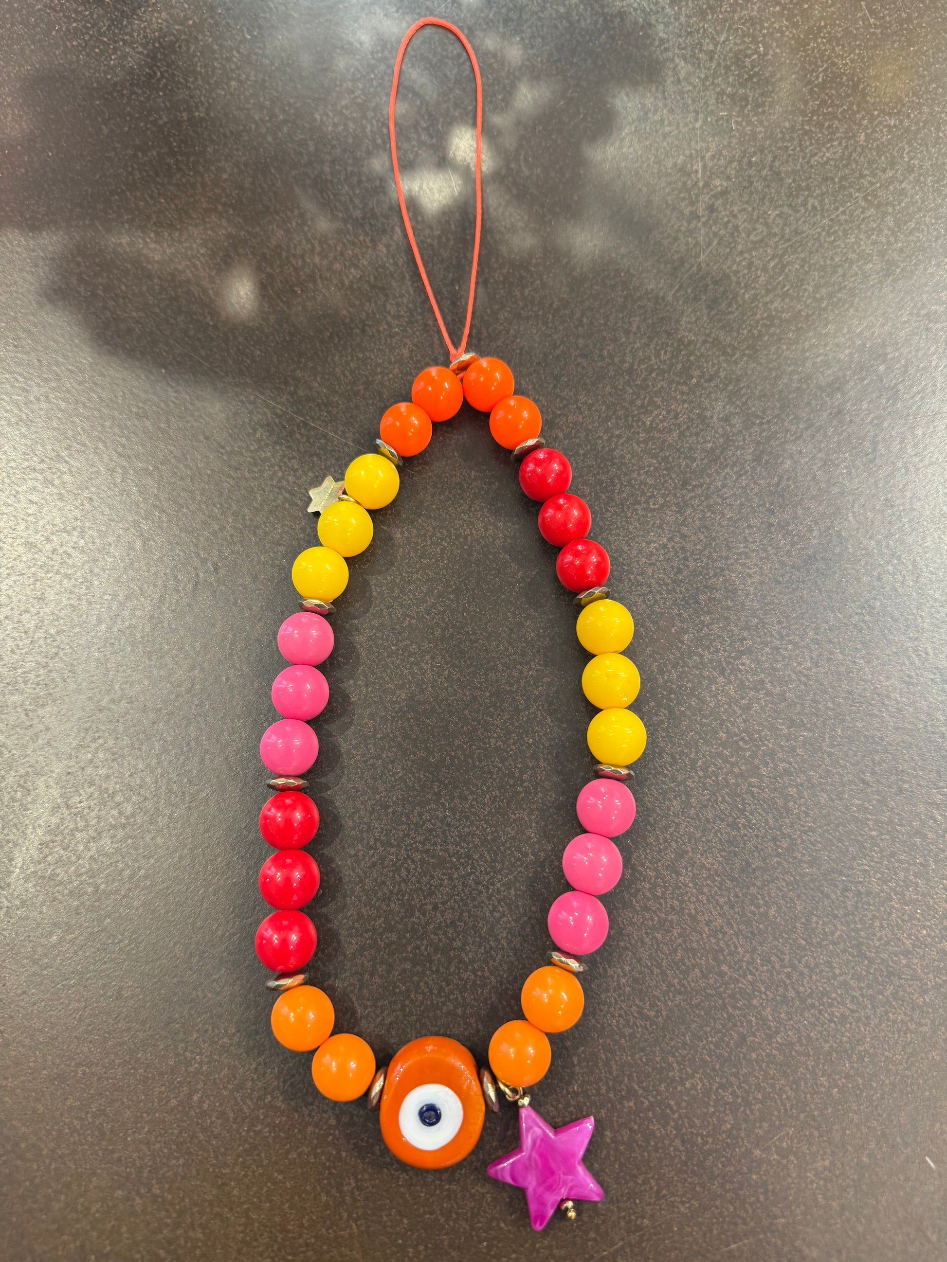Phone holder tutti frutti  star - detail shot - bracelet | Love Letters Tel Aviv