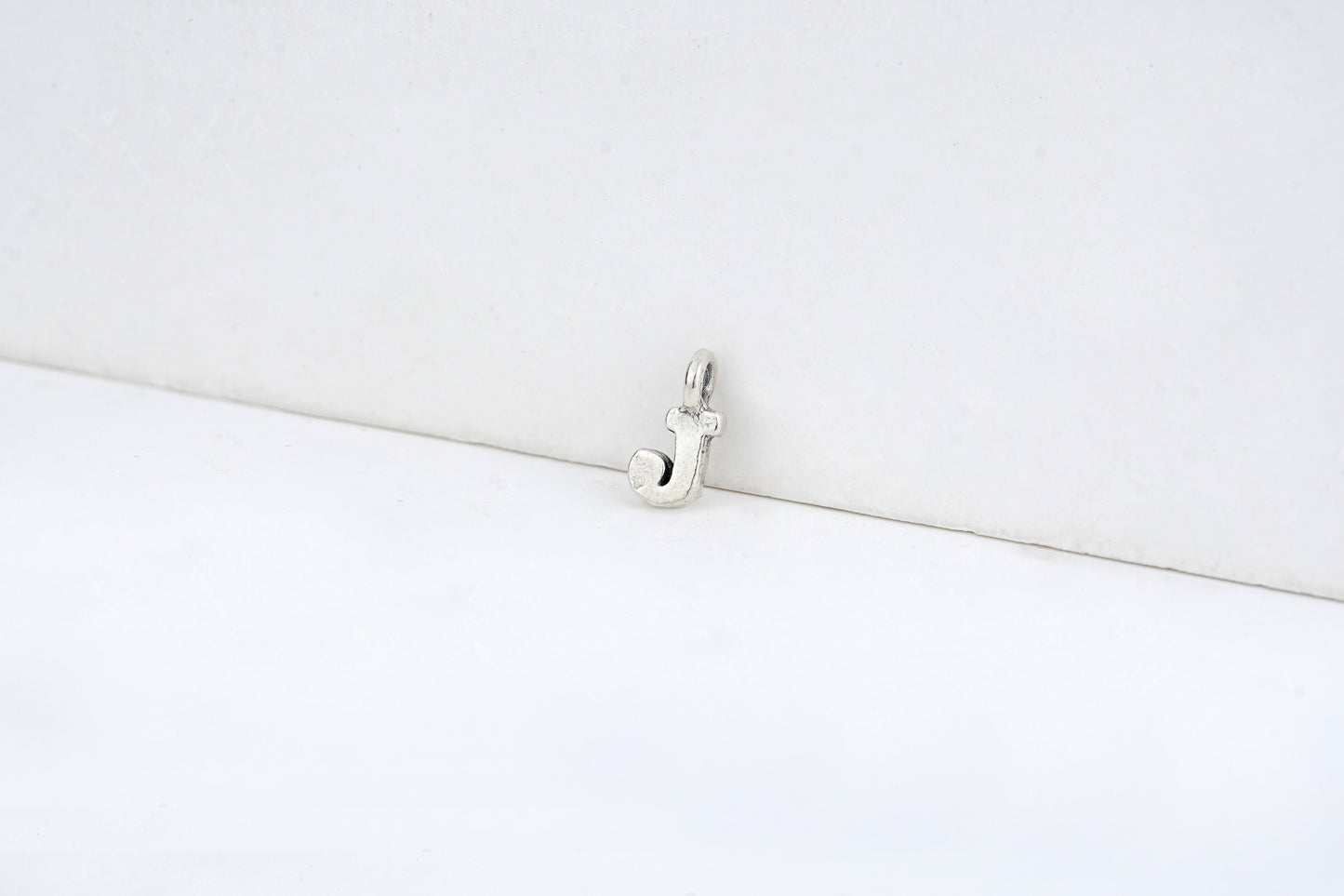 j - detail shot - English letter charm | Love Letters Tel Aviv