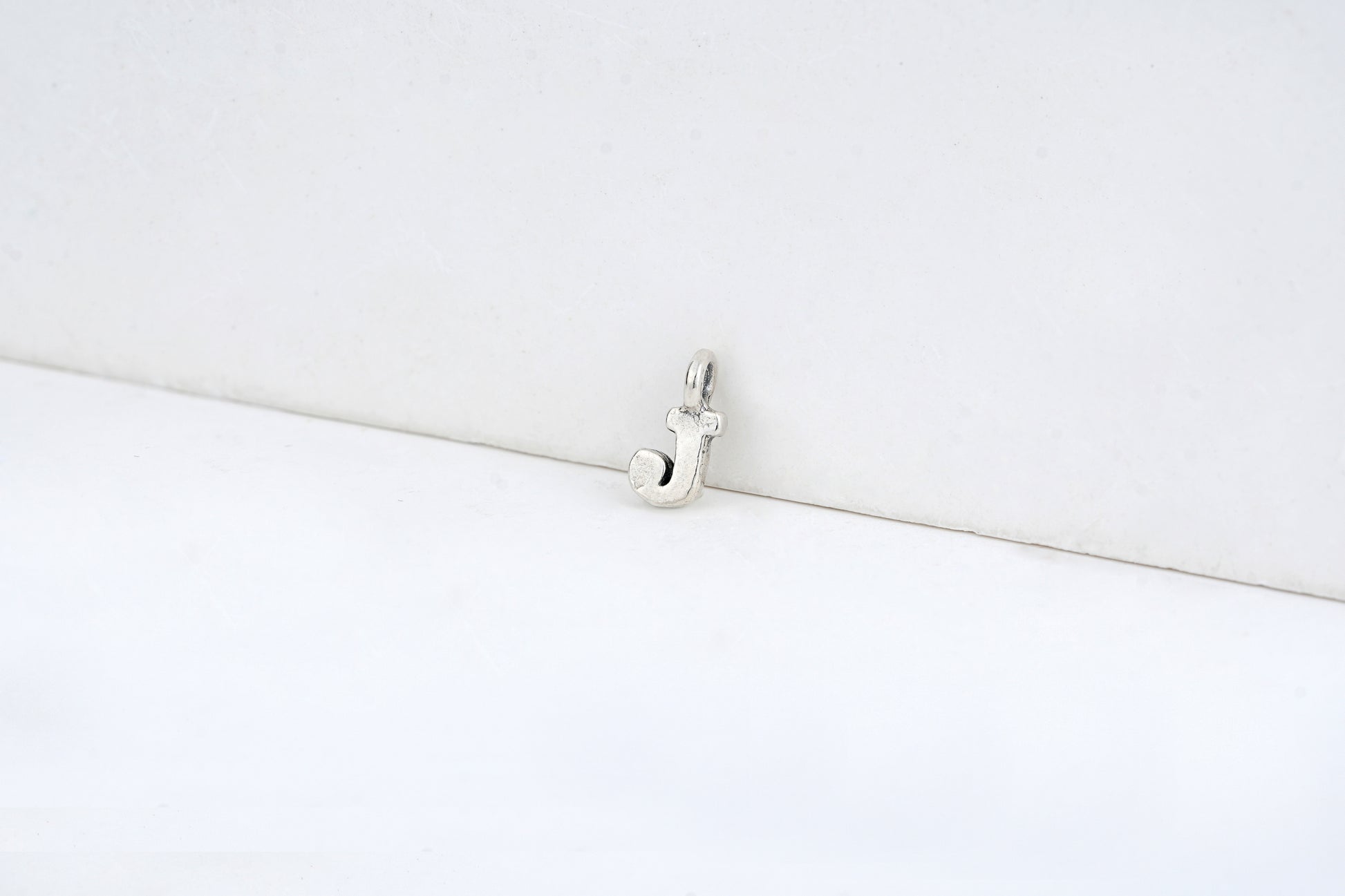 j - detail shot - English letter charm | Love Letters Tel Aviv