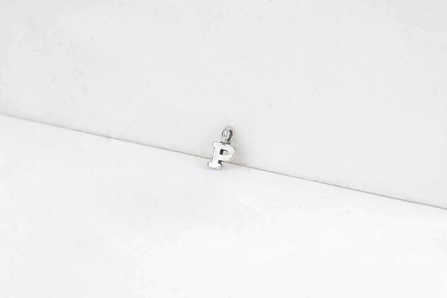 p - detail shot - English letter charm | Love Letters Tel Aviv