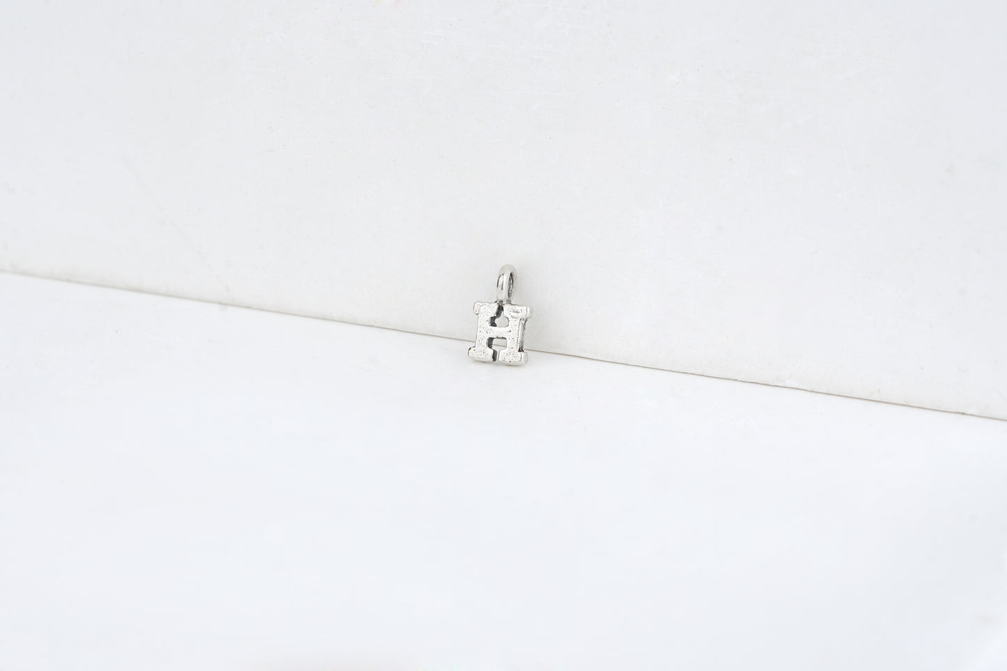 h - detail shot - English letter charm | Love Letters Tel Aviv