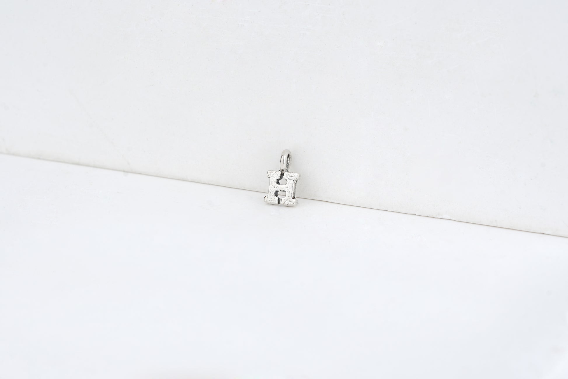 h - detail shot - English letter charm | Love Letters Tel Aviv