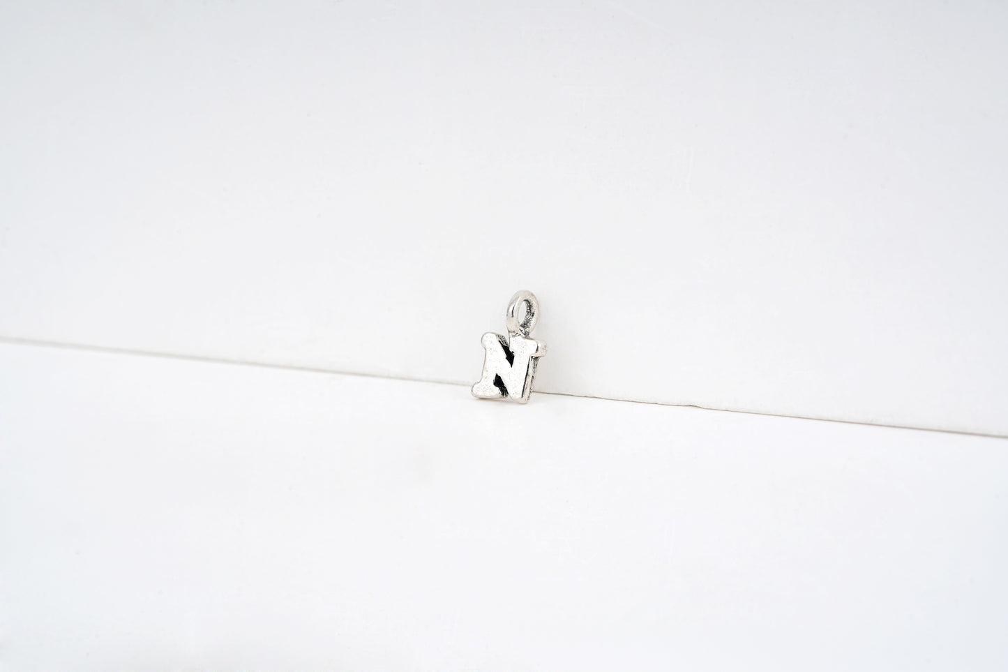 n - detail shot - English letter charm | Love Letters Tel Aviv