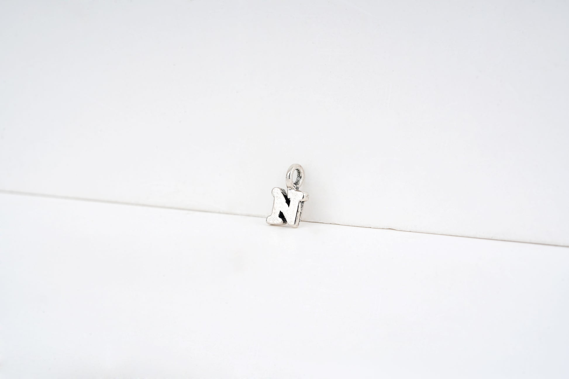 n - detail shot - English letter charm | Love Letters Tel Aviv