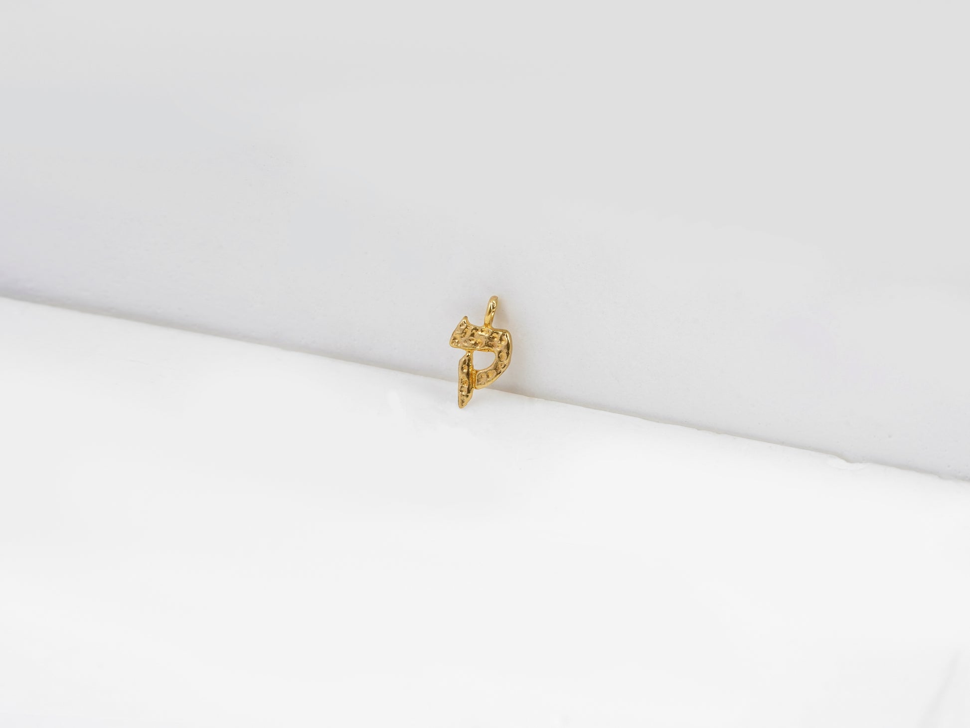 ק - kouf - detail shot - Hebrew letter charm | Love Letters Tel Aviv