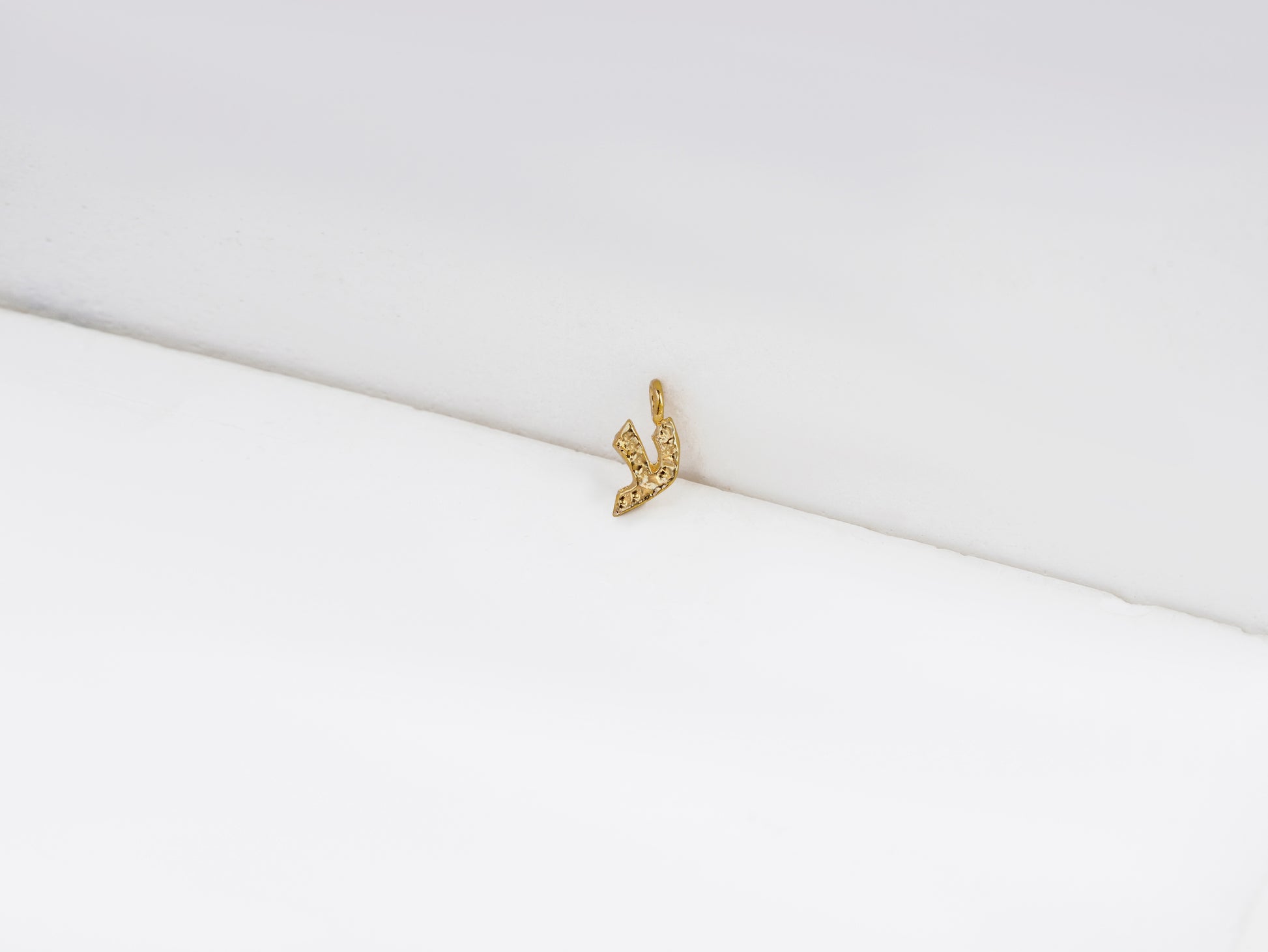 ע - ayin - detail shot - Hebrew letter charm | Love Letters Tel Aviv