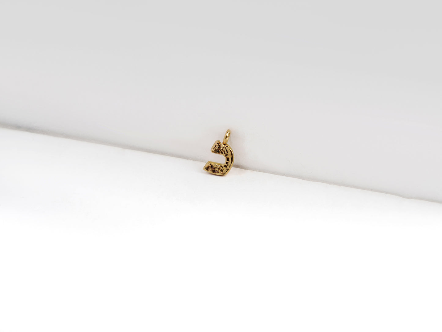 כ - kaf - detail shot - Hebrew letter charm | Love Letters Tel Aviv