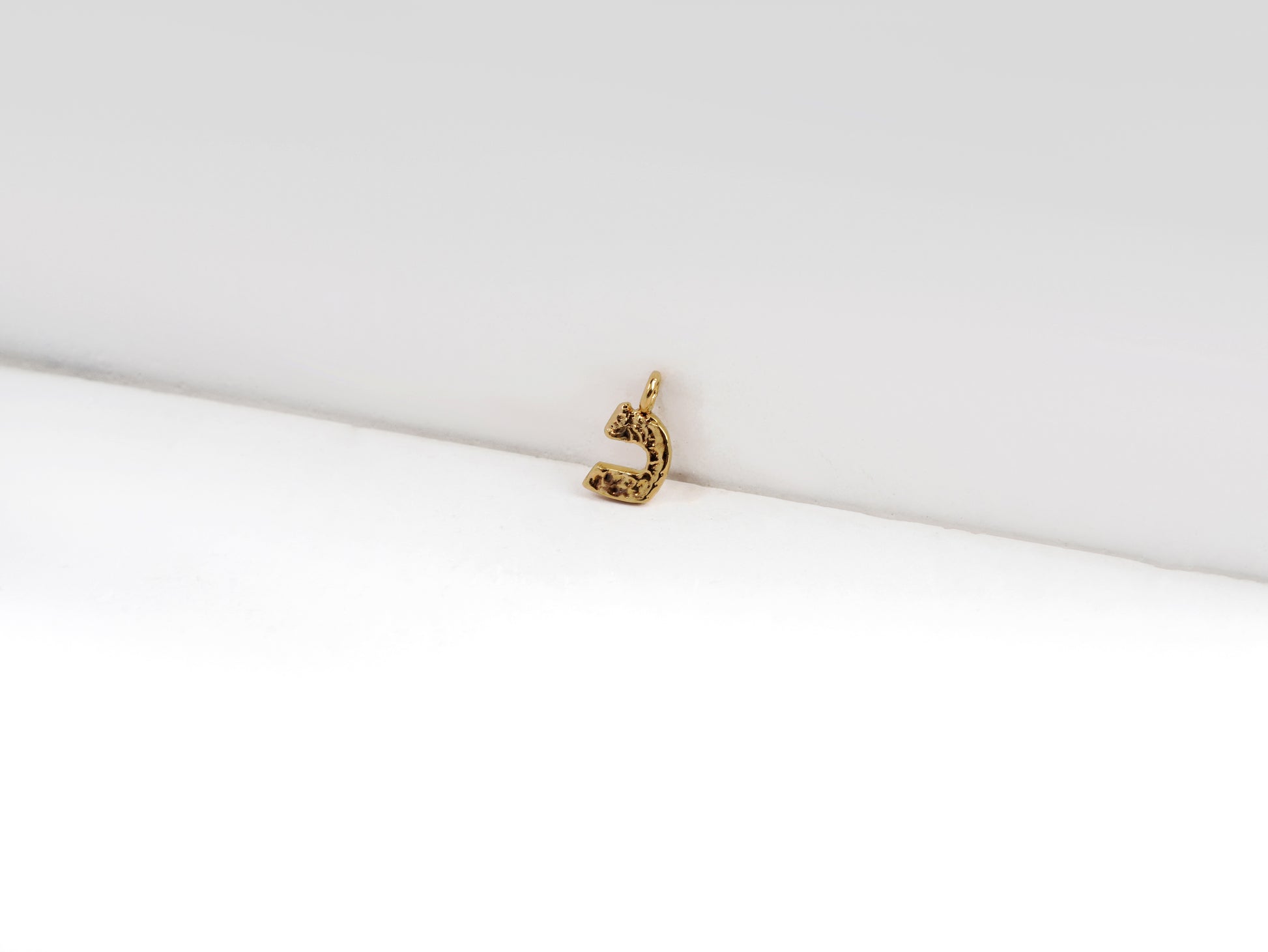 כ - kaf - detail shot - Hebrew letter charm | Love Letters Tel Aviv