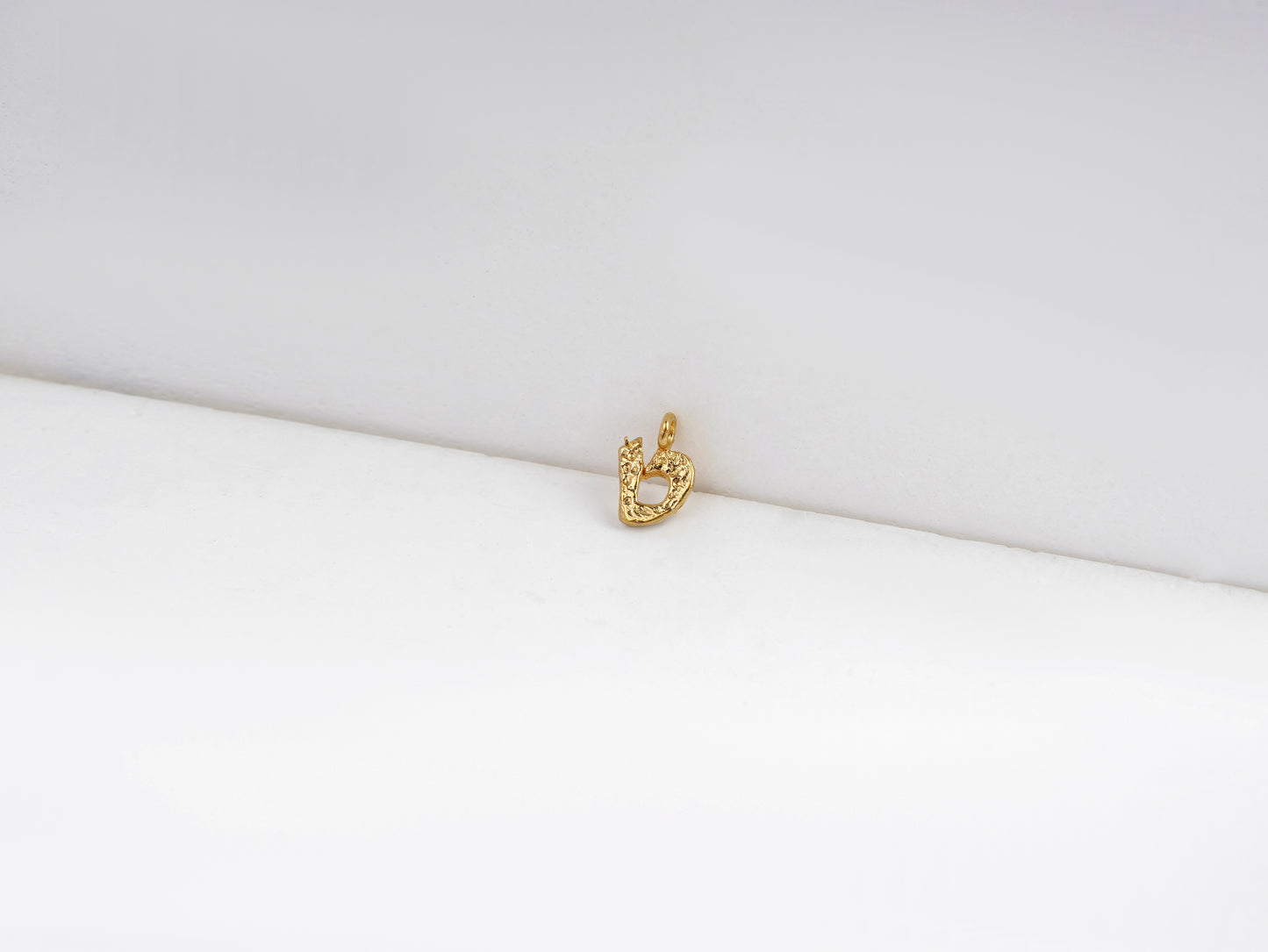 ט - tet - detail shot - Hebrew letter charm | Love Letters Tel Aviv