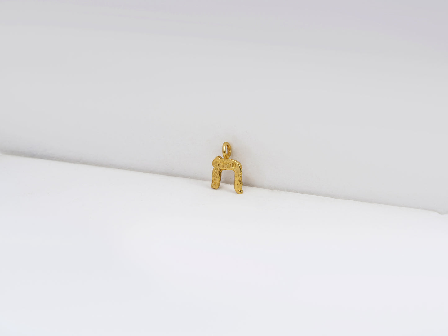 ח - chet - detail shot - Hebrew letter charm | Love Letters Tel Aviv