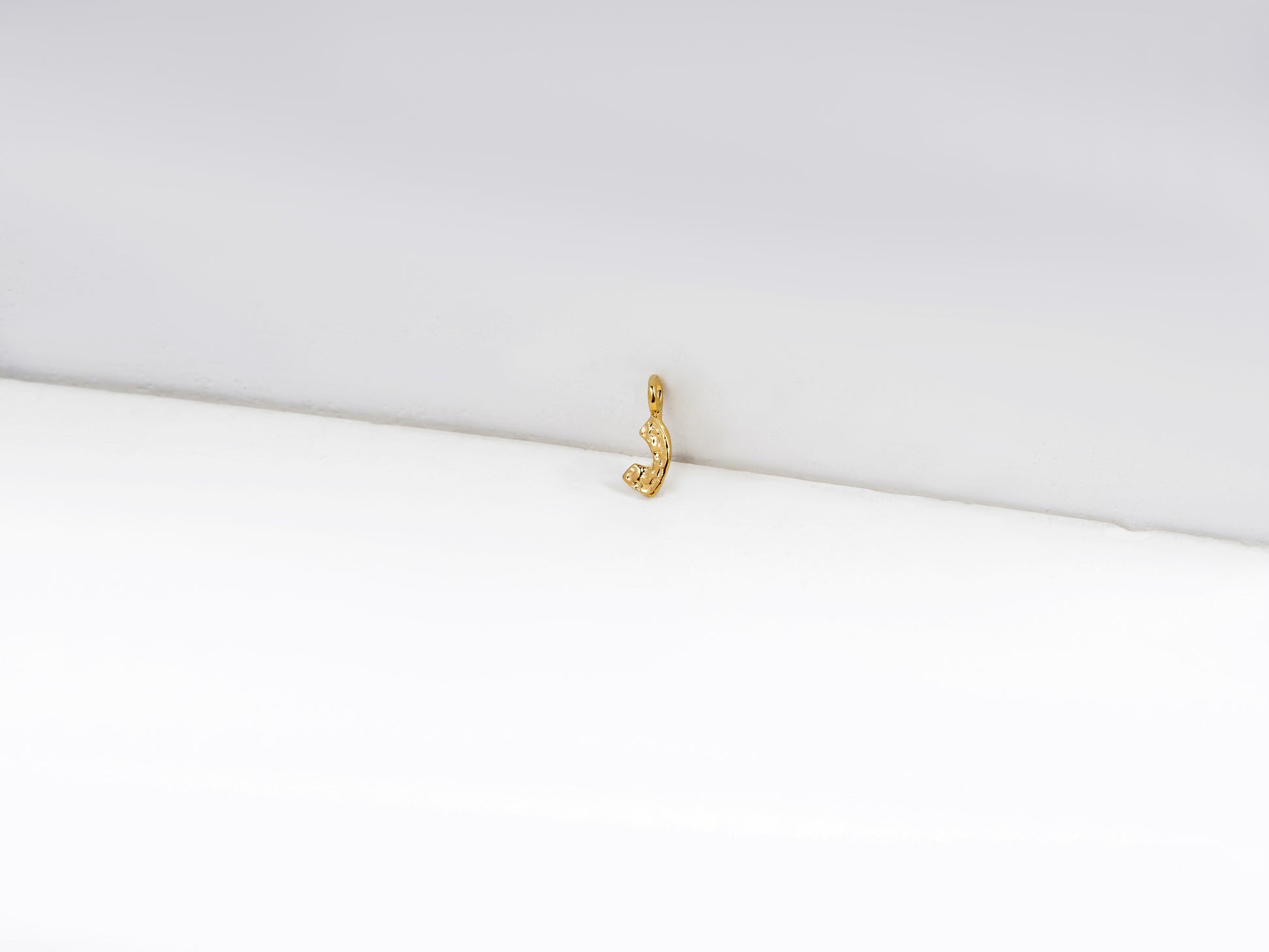 נ - nun - detail shot - Hebrew letter charm | Love Letters Tel Aviv