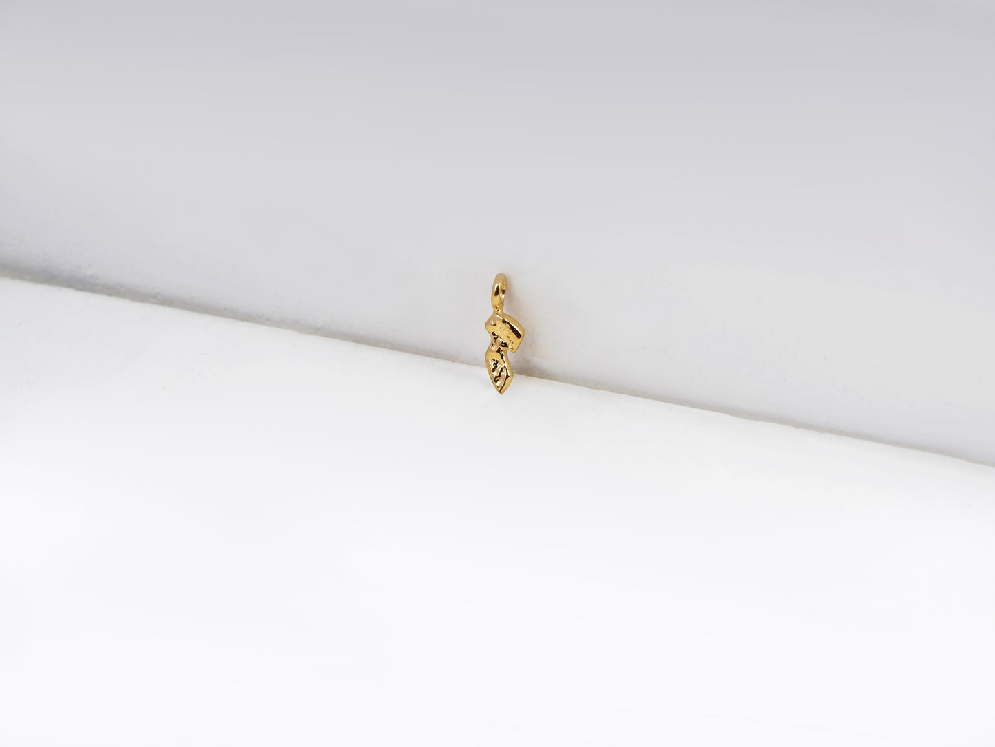 ז - zain - detail shot - Hebrew letter charm | Love Letters Tel Aviv