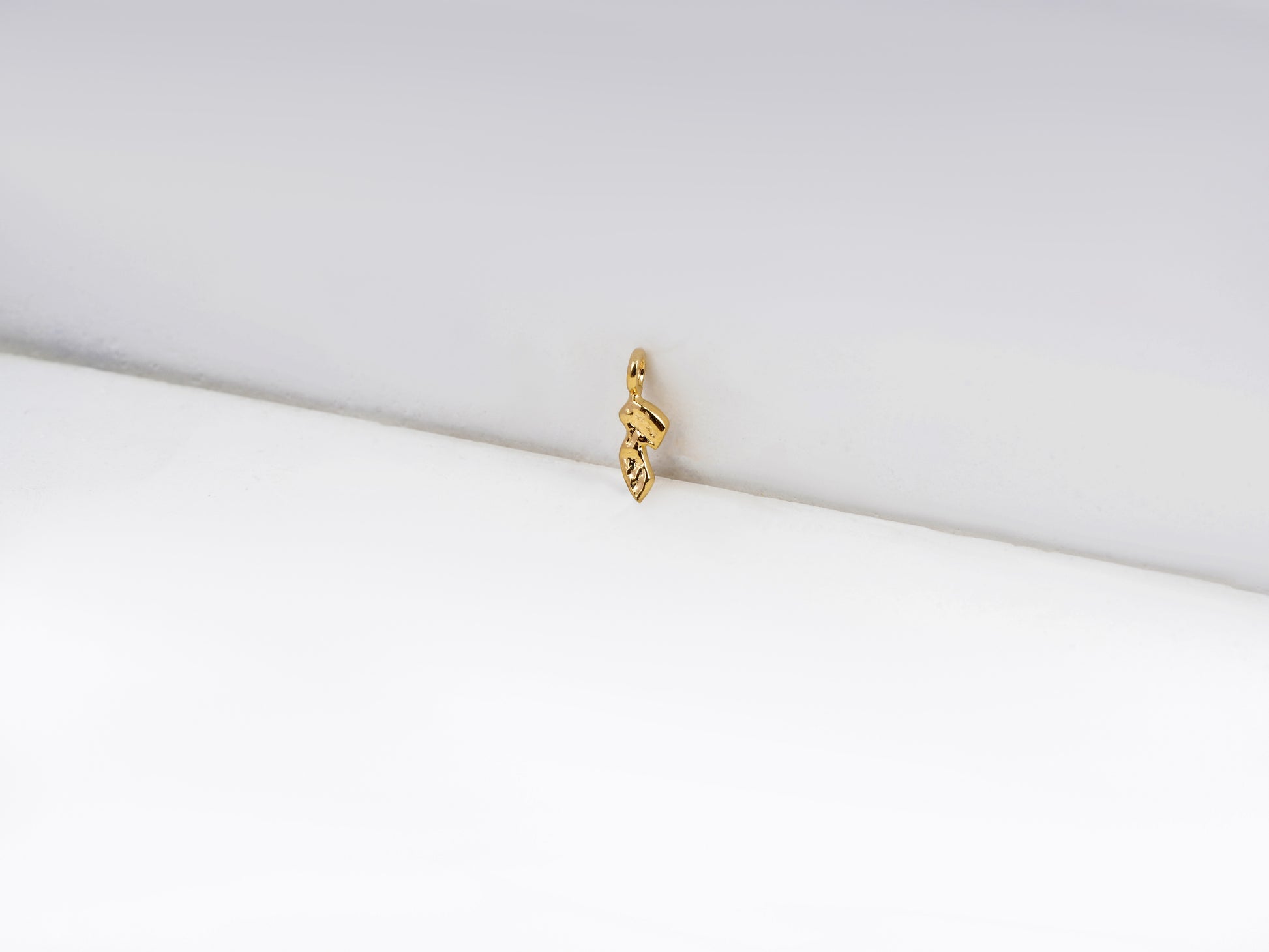 ז - zain - detail shot - Hebrew letter charm | Love Letters Tel Aviv