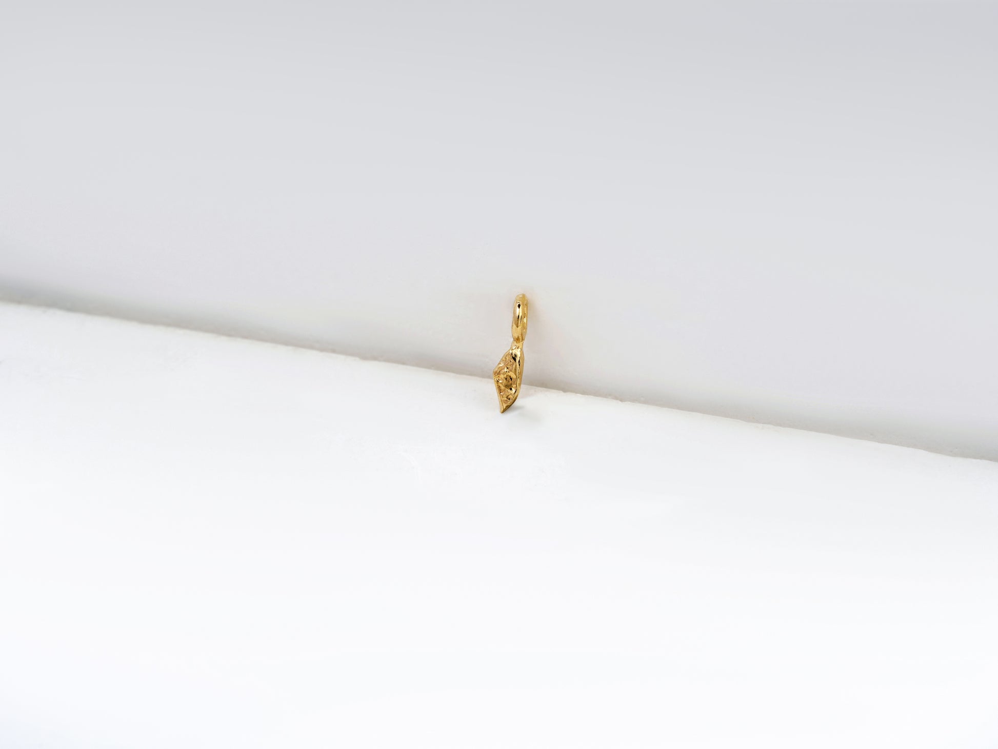 י - yud - detail shot - Hebrew letter charm | Love Letters Tel Aviv