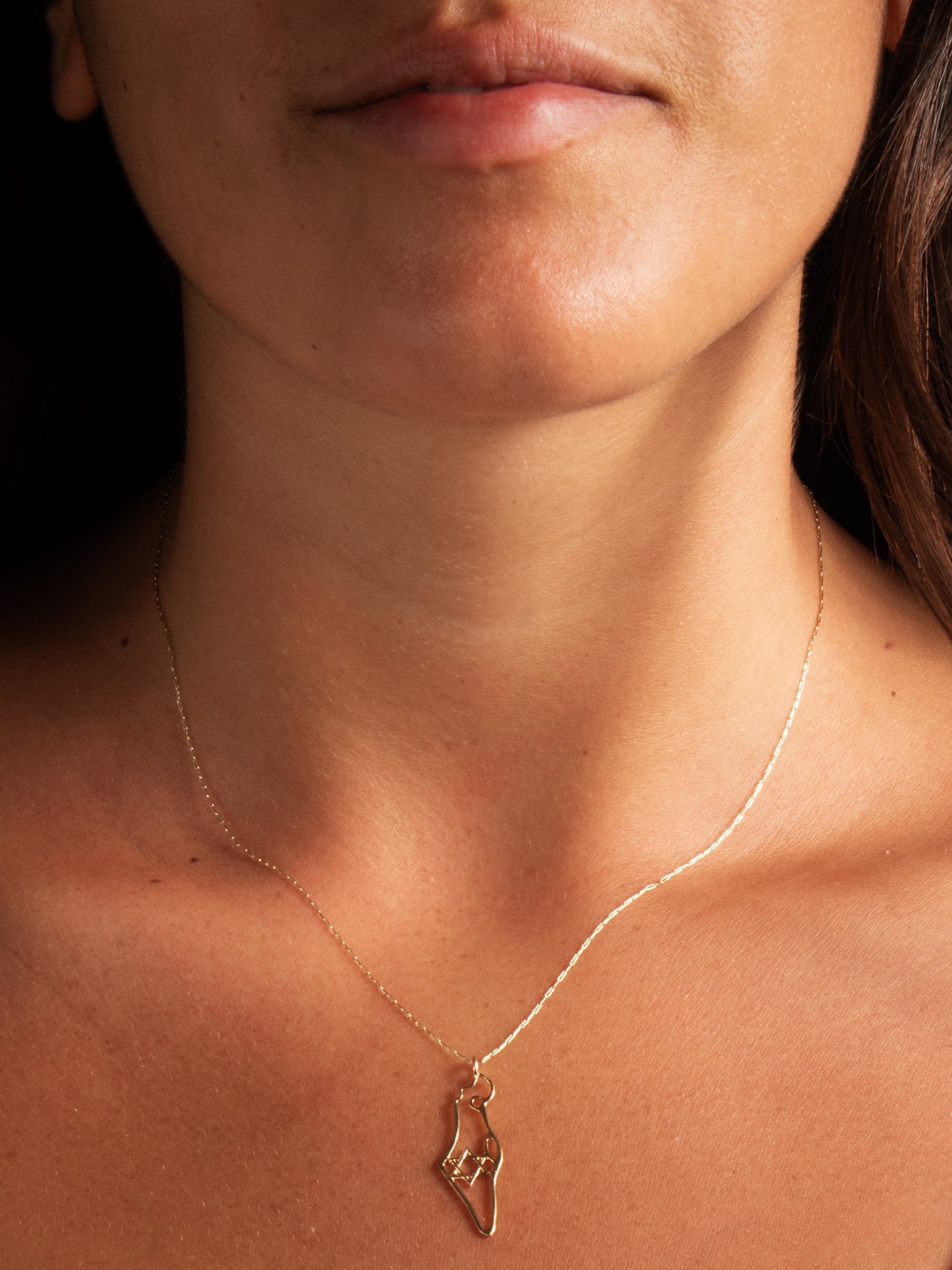 Eretz Shelanu - worn on model - Judaica charm | Love Letters Tel Aviv