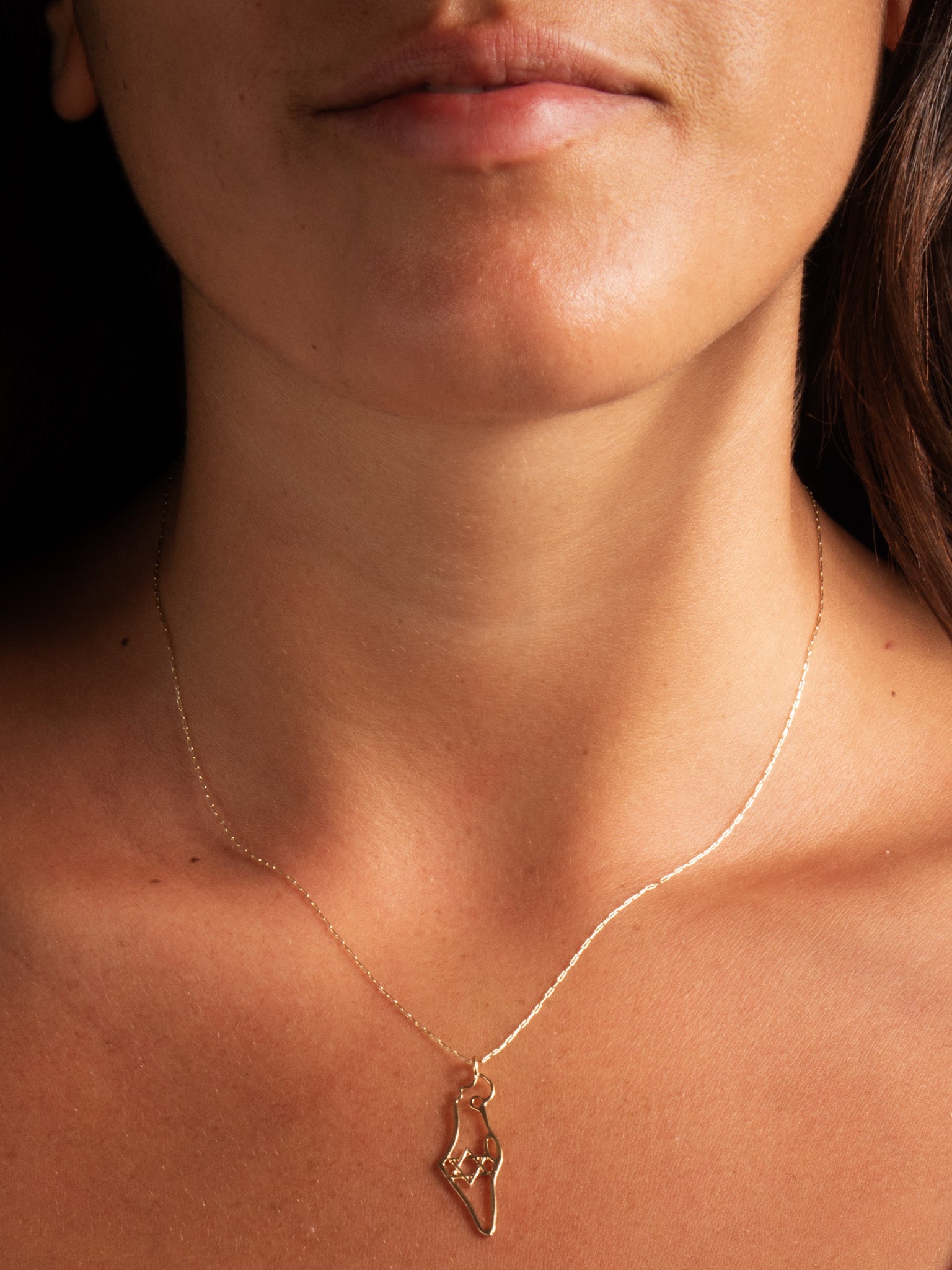 Eretz Shelanu - worn on model - Judaica charm | Love Letters Tel Aviv