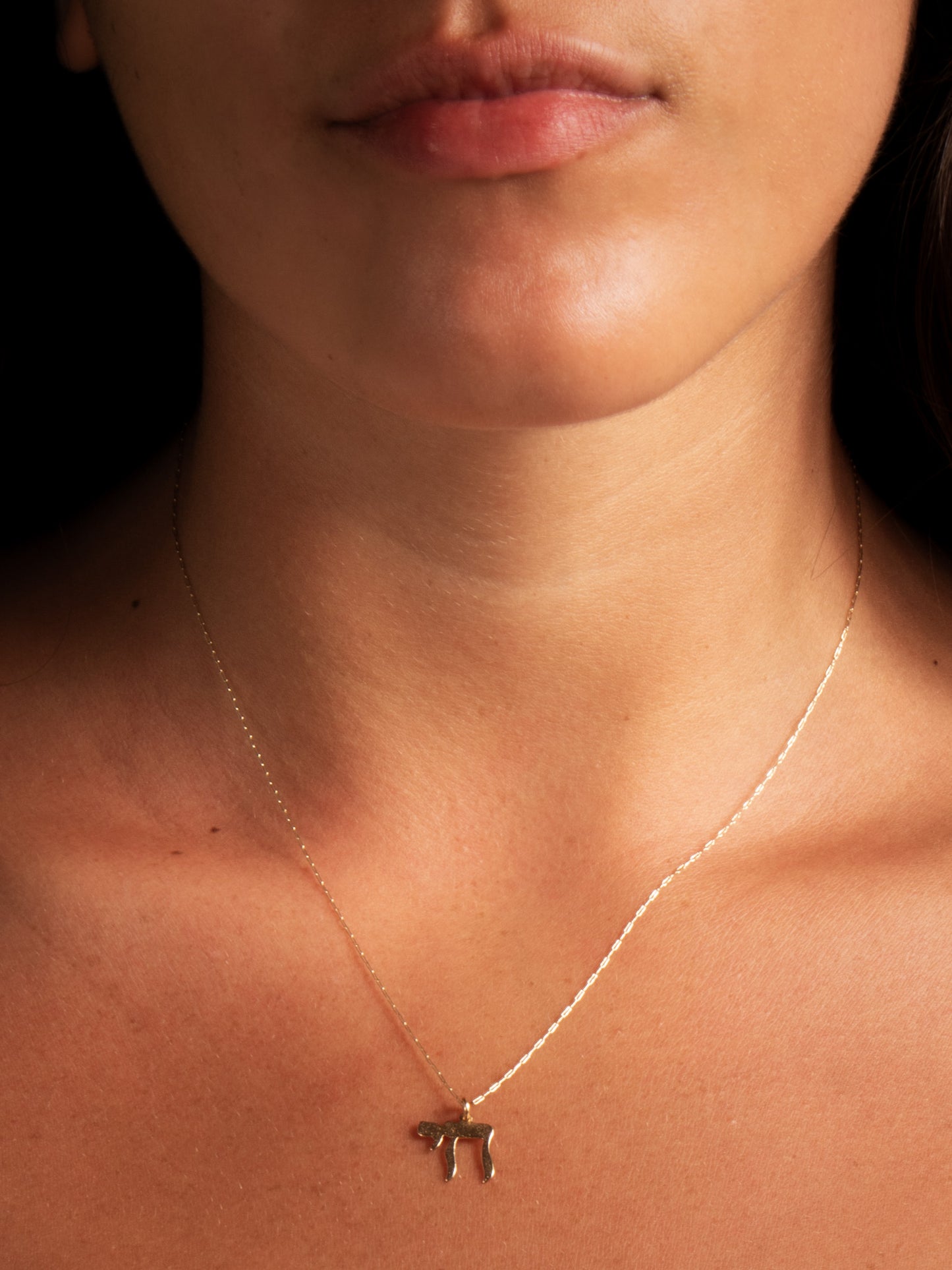 Medium Flat Chai - worn on model - Judaica charm | Love Letters Tel Aviv