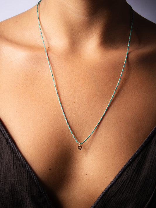 cutie golden magen on blue string - worn on model - necklace | Love Letters Tel Aviv